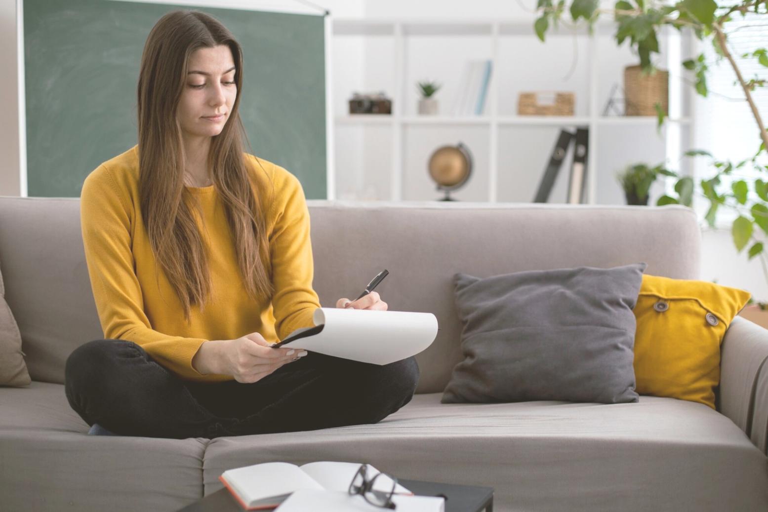 Professional financial analysis workspace showing charts, documents and modern technology tools